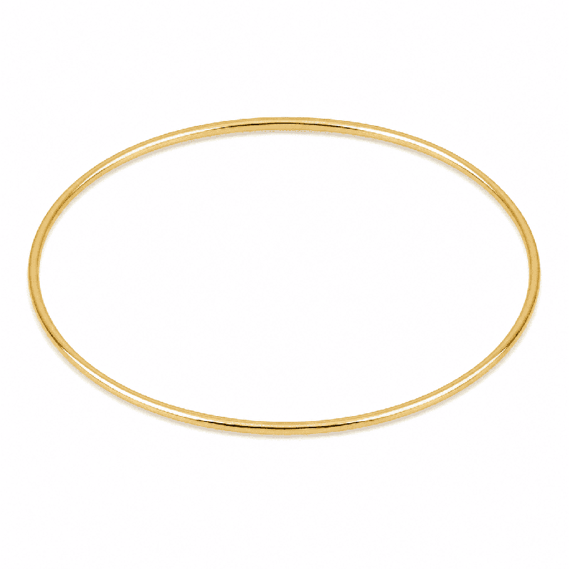 Brazalete fino de acero inoxidable con diseño minimalista y acabado brillante COLOR DORADO