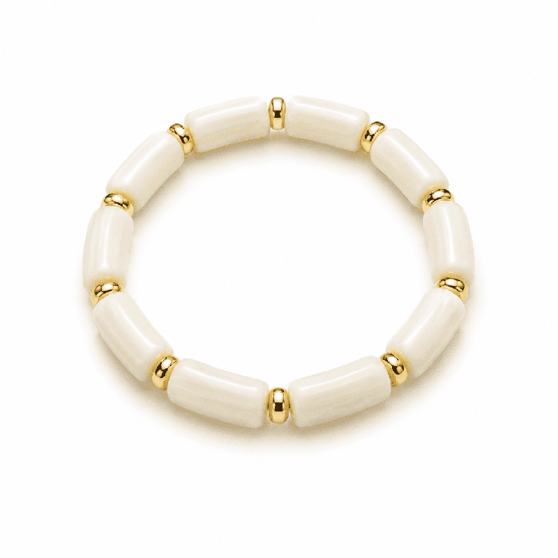 Pulsera elástica de diseño moderno con piezas cilíndricas  COLOR BLANCO