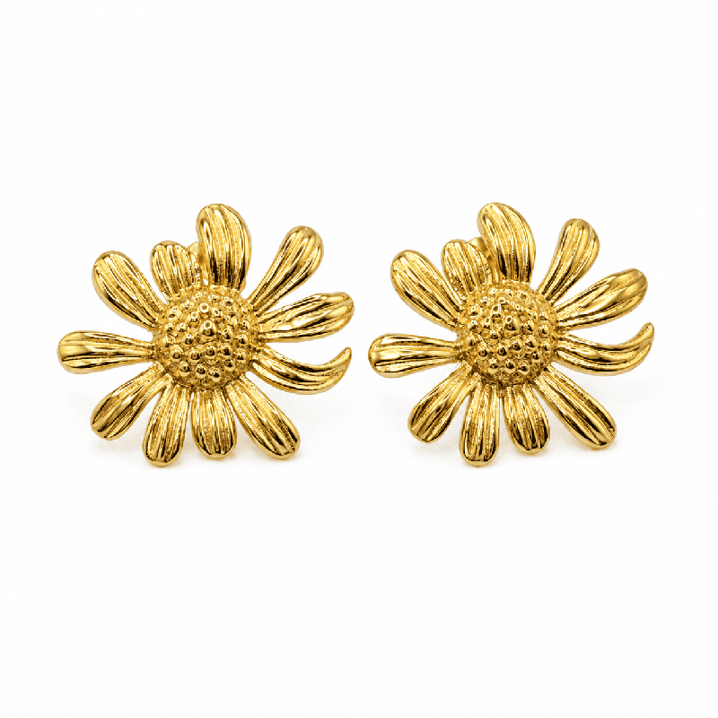 Pendientes tipo botón con diseño floral y acabado dorado brillante