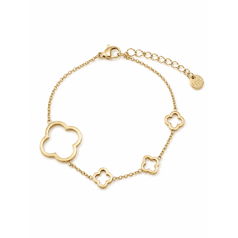 Pulsera fina con delicado diseño de tréboles abiertos y acabado brillante premium