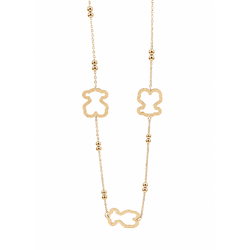 Collar largo de diseño delicado con detalles tipo osito y pequeñas esferas decorativas de acabado premium.