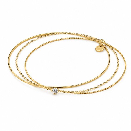 Set de pulseras finas en capas con diseño elegante y minimalista.