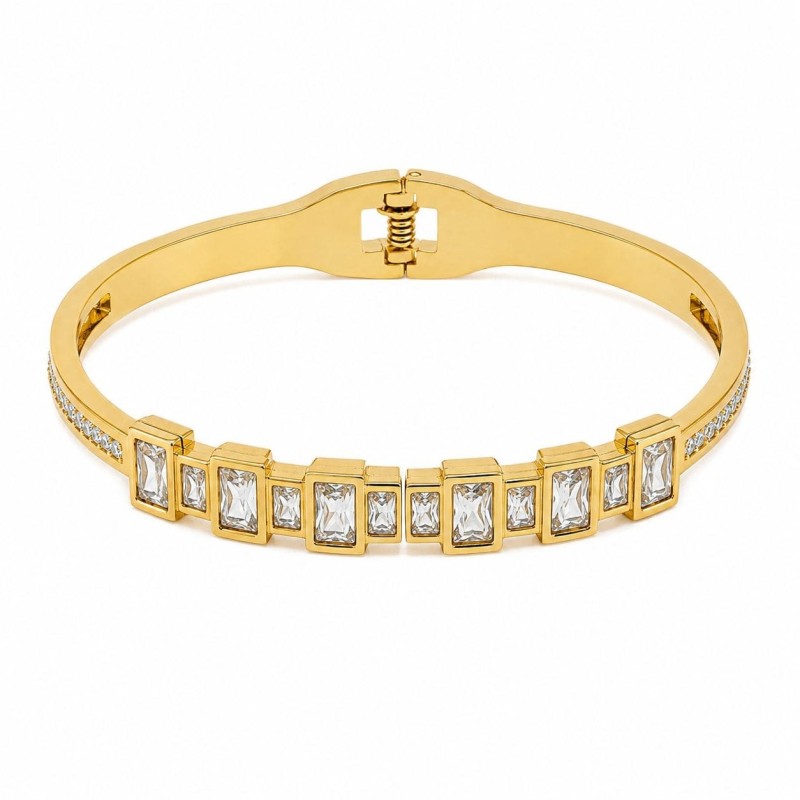 Pulsera rígida con circonitas rectangulares de acabado brillante que aportan un estilo elegante, moderno y sofisticado.