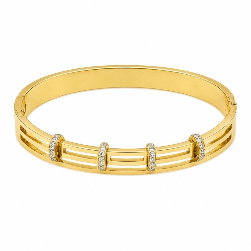 Pulsera rígida de diseño geométrico con delicados detalles de circonitas que aportan un brillo elegante y sofisticado.