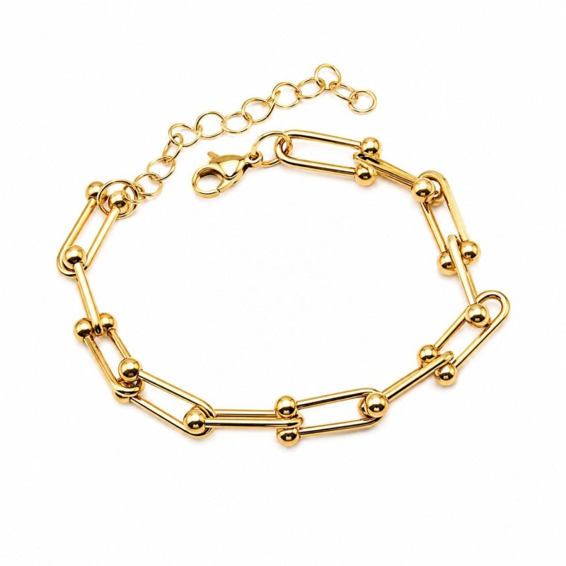 Pulsera de diseño moderno con eslabones alargados y delicados detalles esféricos que aportan un acabado elegante y sofisticado.