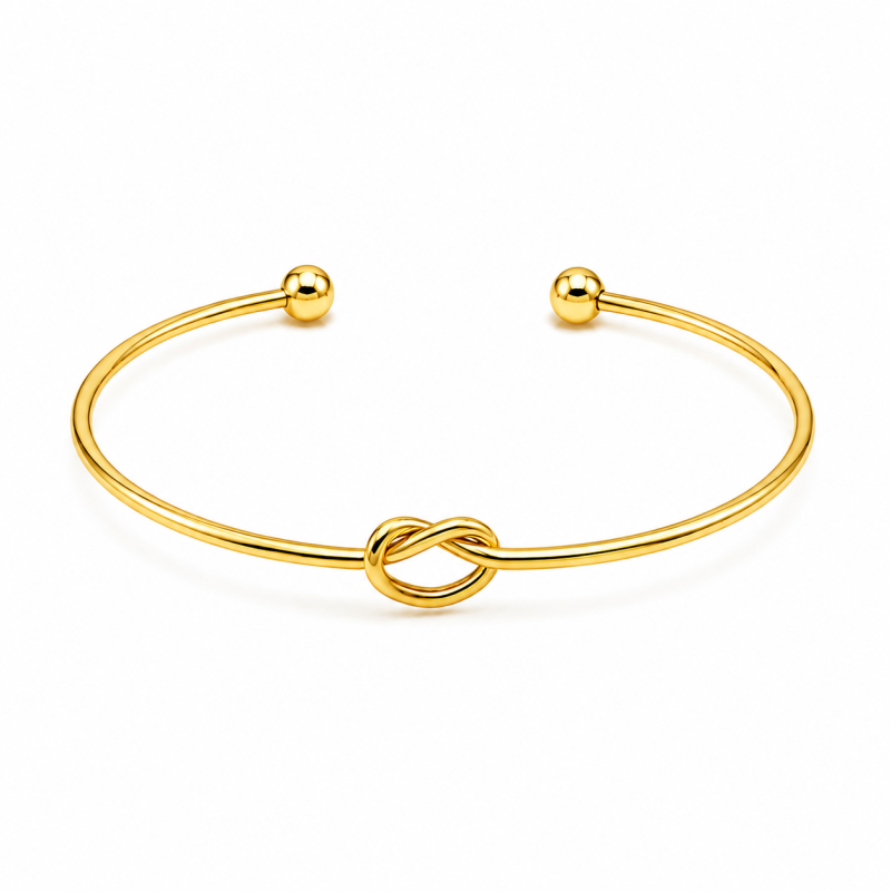Brazalete de diseño minimalista y sofisticado, con acabado texturizado que aporta un estilo moderno y elegante color dorado