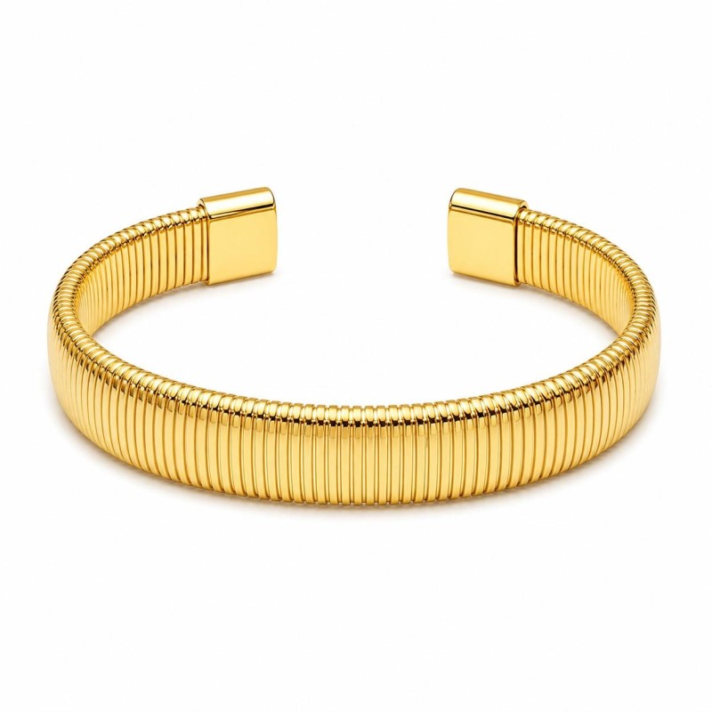 Brazalete minimalista de líneas finas y diseño elegante, ideal para quienes buscan un accesorio delicado y moderno color dorado