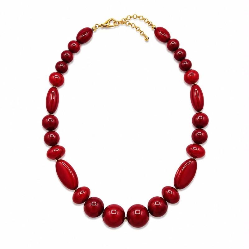 Collar de inspiración elegante y luminosa compuesto por cuentas en tono blanco roto translúcido con delicados matices nacarados.