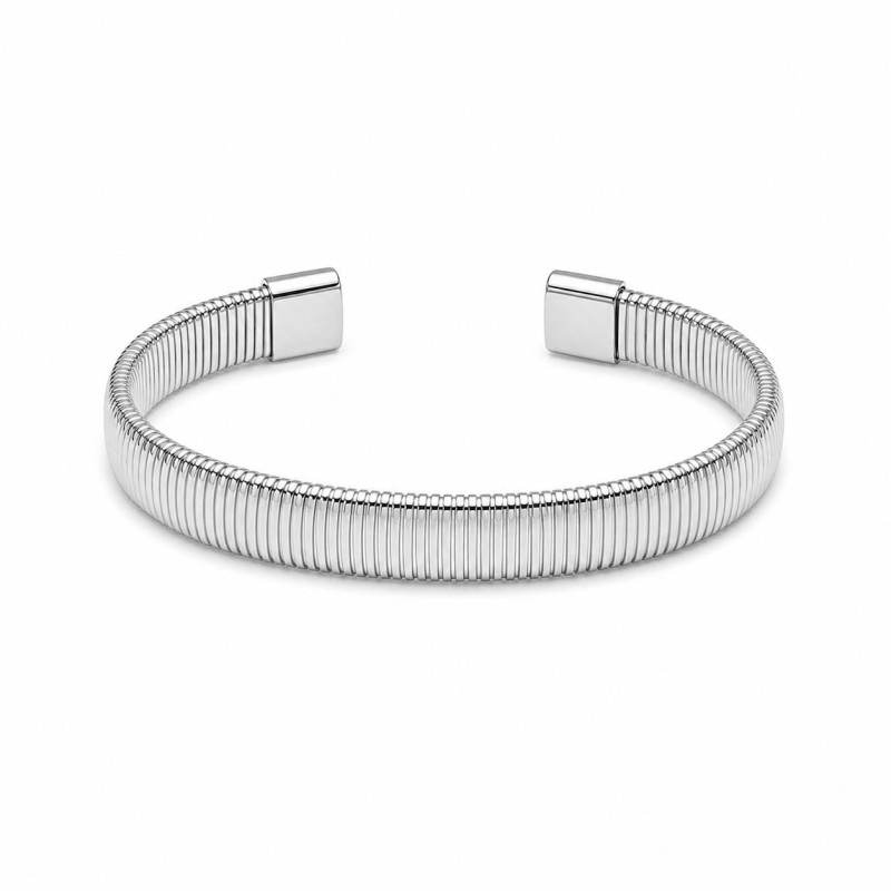 Brazalete minimalista de líneas finas y diseño elegante, ideal para quienes buscan un accesorio delicado y moderno. color plata