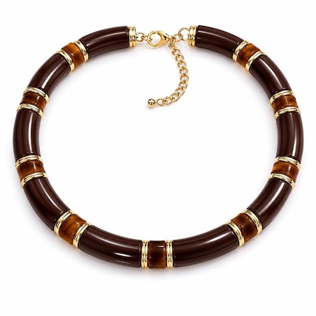 Collar de inspiración artesanal y sofisticada que combina piezas de resina en tonos tierra.