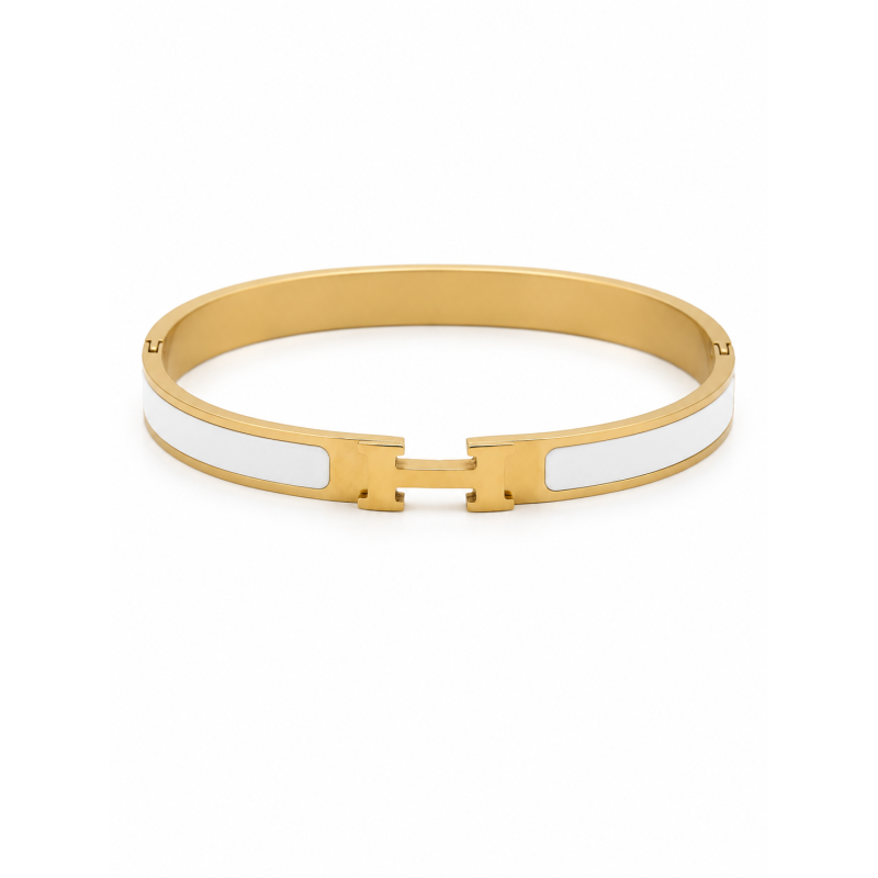 Brazalete rígido de diseño moderno con detalles esmaltados y acabado premium.