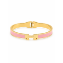 Brazalete rígido de diseño moderno con detalles esmaltados y acabado premium.