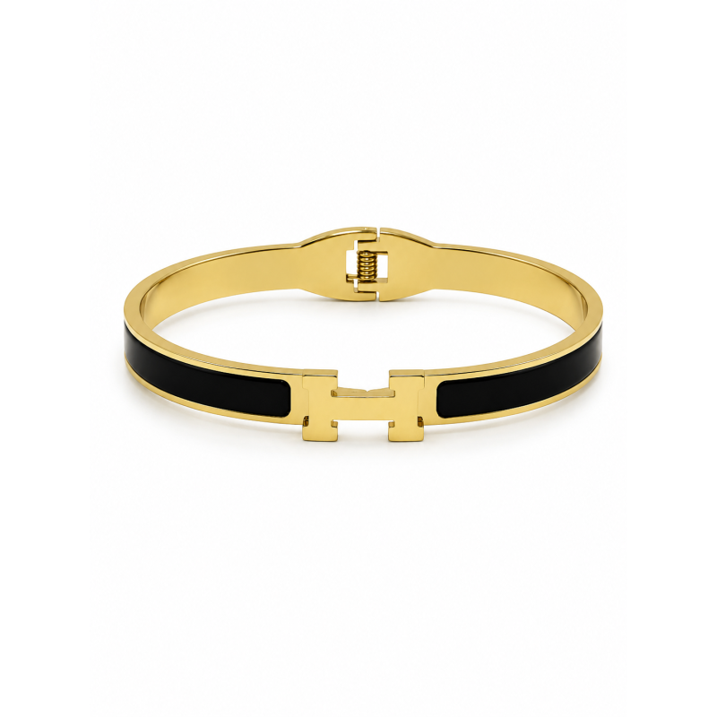 Brazalete rígido de diseño moderno con detalles esmaltados y acabado premium.